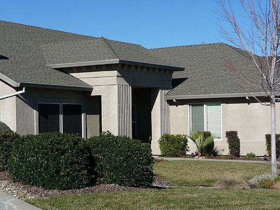 Attractive stucco exterior with premium shingle roof