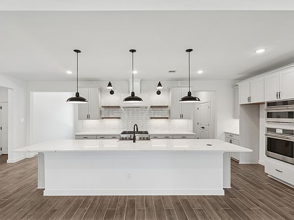 Kitchen with stylish floating shelves