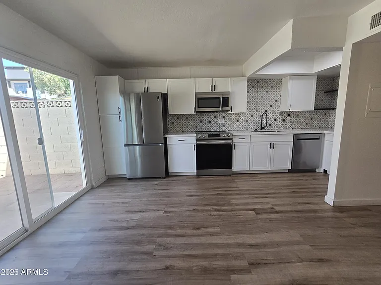 4848 N Woodmere Fairway #16 — Photo 1