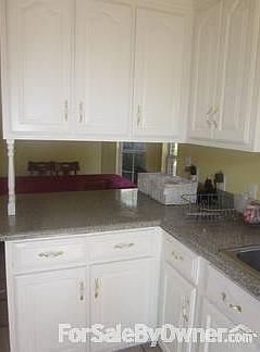 Kitchen : Curtains, stove, refrigerator, large microwave and dishwasher will stay.