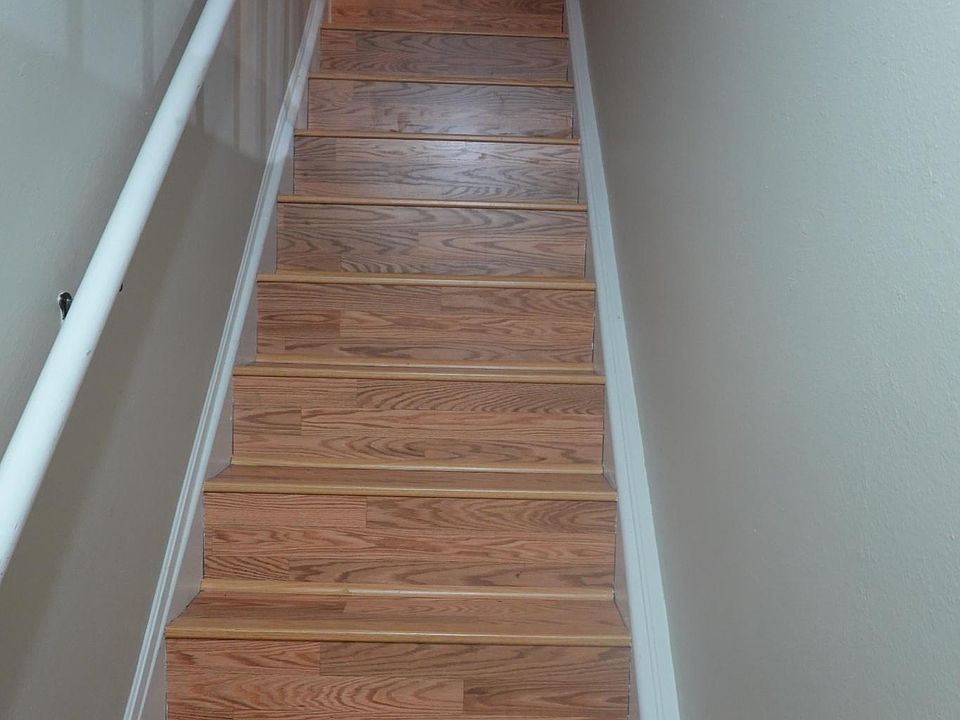 Basement stairs up to living room