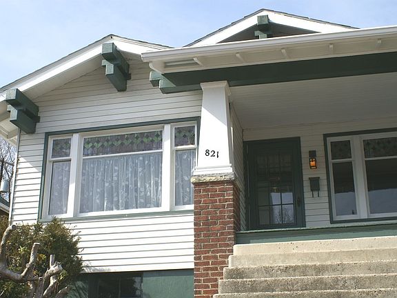 Left of front, exposed roof beams