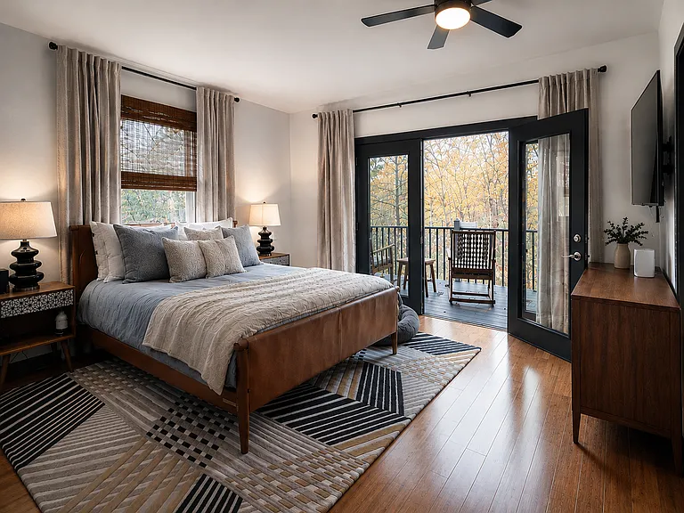 Master Bedroom with large deck under the trees and stars