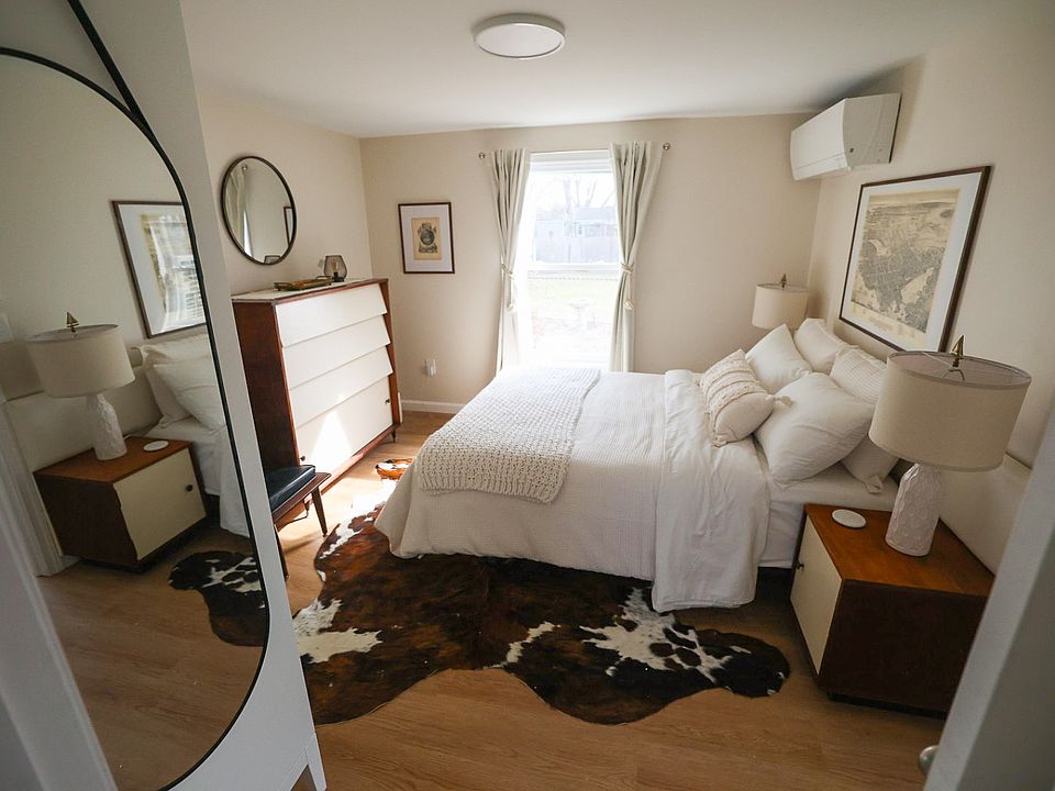 The bedroom from the bathroom door.