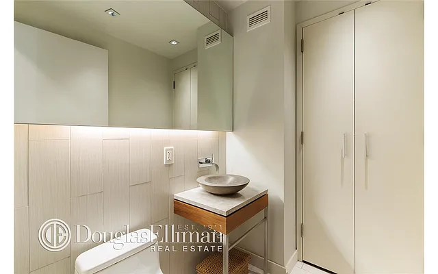 Sold by Douglas Elliman | media 13