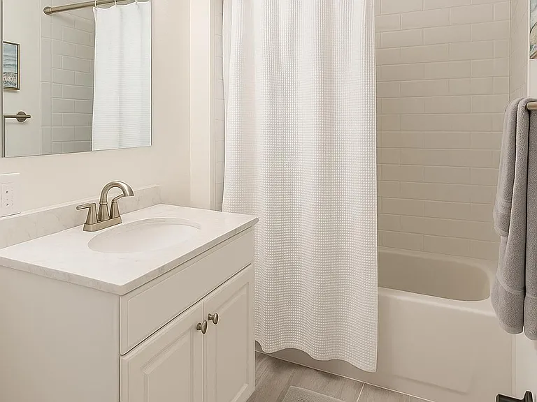 Bright common sink space with a tidy, practical layout