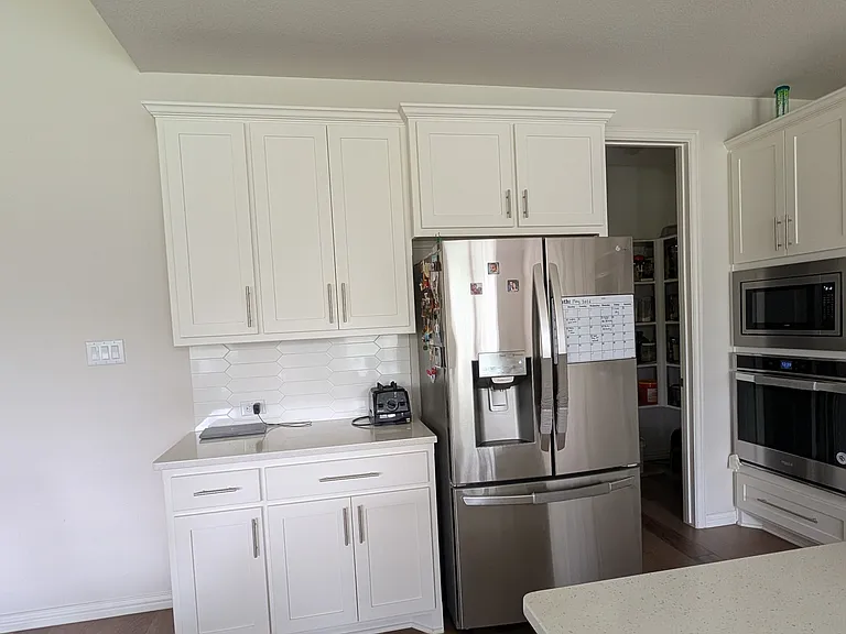 This French door refrigerator is included in the rent