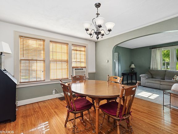 The rich solid hardwood flooring makes this room glow.
