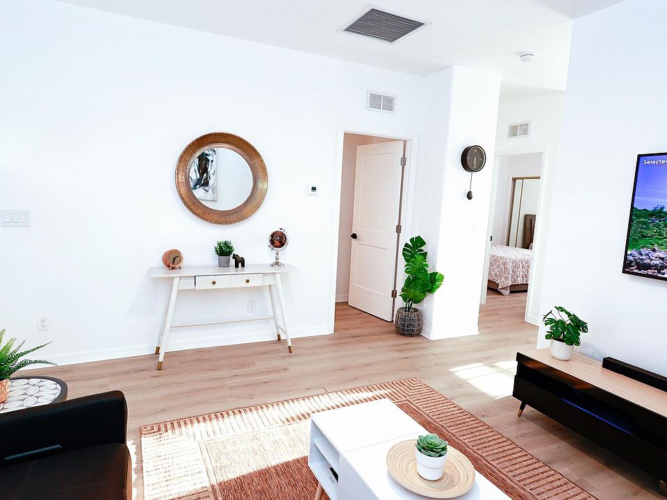 You'll find a spacious living room area with coffee table/workstation, 60" Smart TV display with your favorite streaming apps, and lots of books and board games.