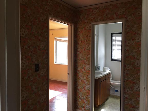 Hallway looking to Room A and Bathroom