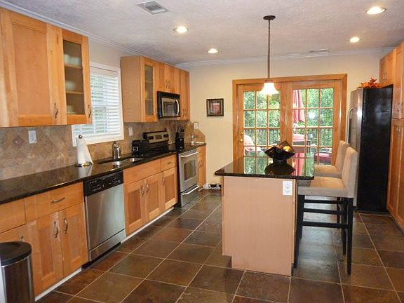 Huge kitchen with all the bells and whistles. All appliances remain.
