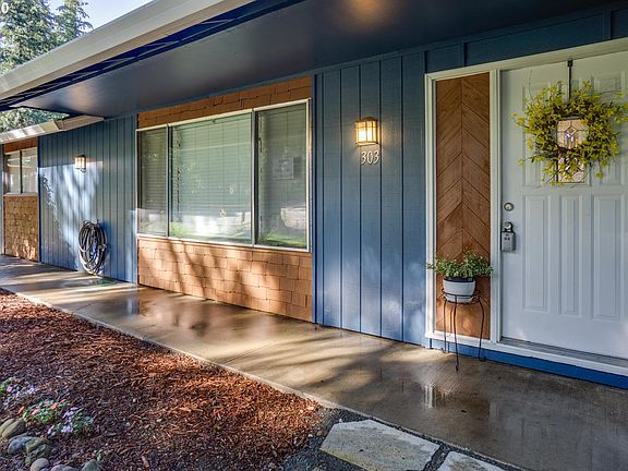 5th image of 303 NE Hearthwood Blvd