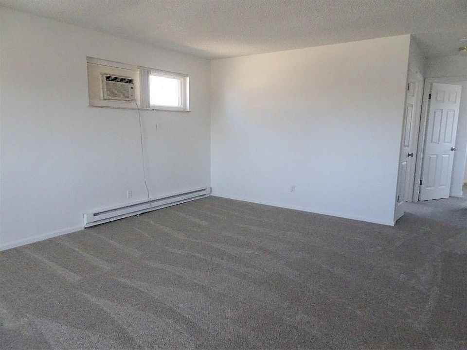 from the front door with the linen closet visible on the right