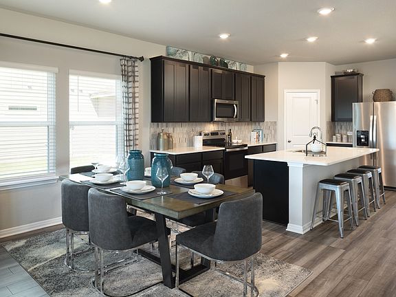 A combined kitchen and dining area make entertaining a breeze.