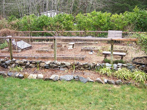 Garden, fruit trees & vines, seating throughout trails