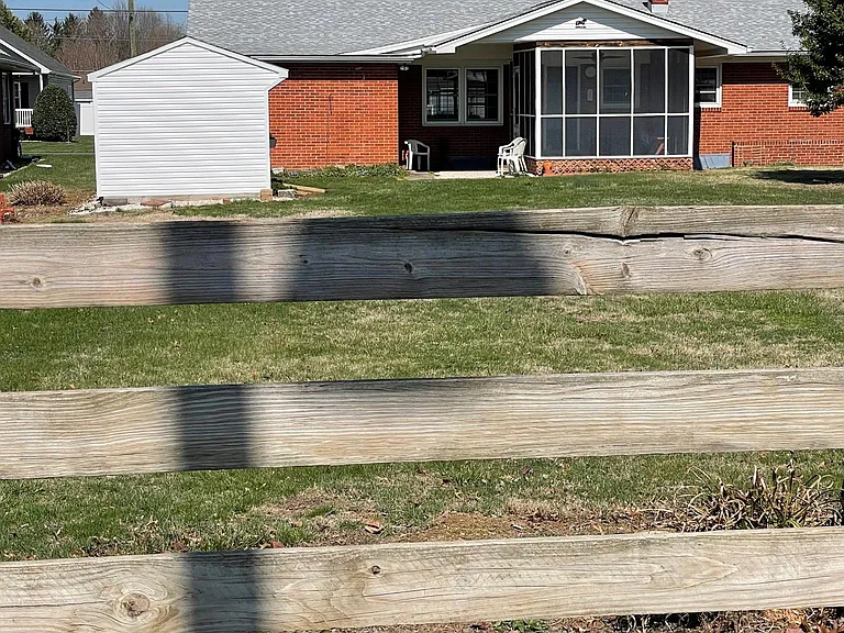 Panel fence borders back of property. Property adjoins Bridgewater Town property that has Tennis Court, playground & more!