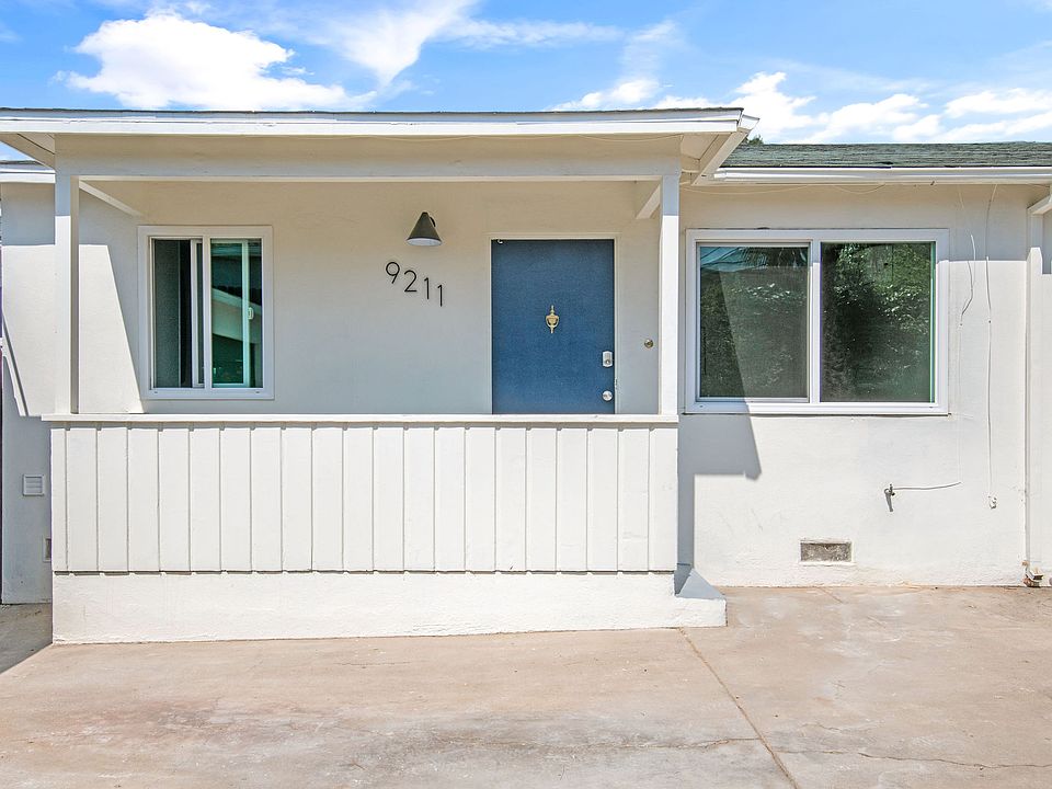 View of front door with private porch