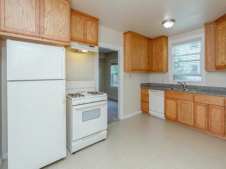 Spacious kitchen with tons of cabinet storage & pantry closet