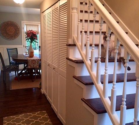 front hallway and wood stairs