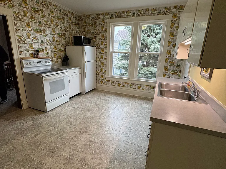 New vinyl tile floor in kitchen