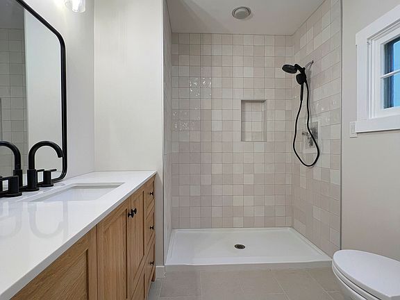 Fully renovated bathroom. Frosted shower doors & shower kit to be installed before move-in.