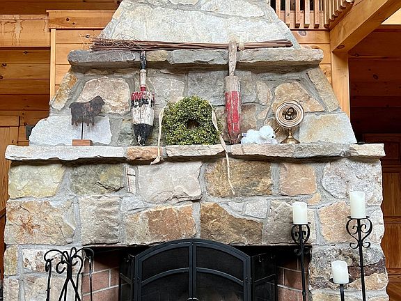 Two story stone fireplace