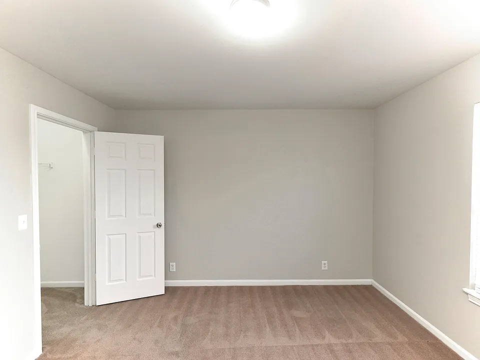 Bedroom with carpet