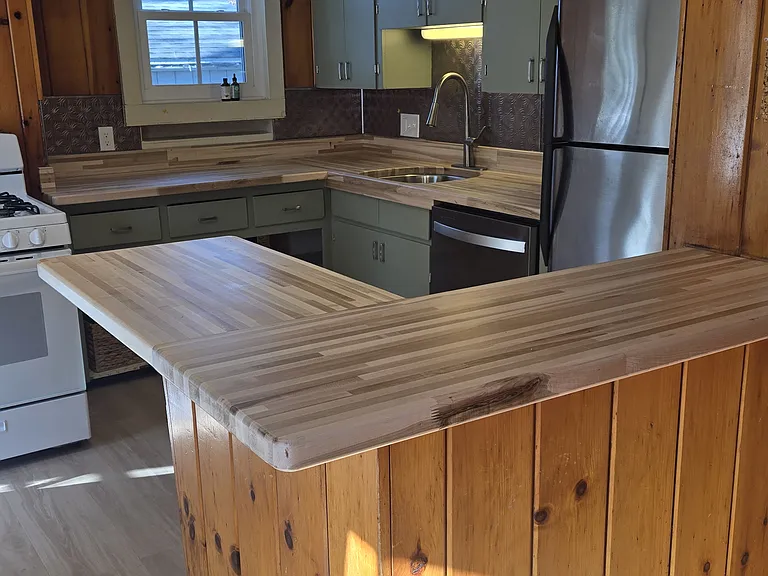 Kitchen with Maple Countertops and Island Countertop