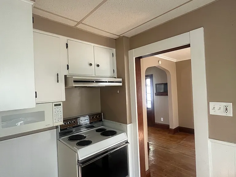 kitchen leading in to dining room