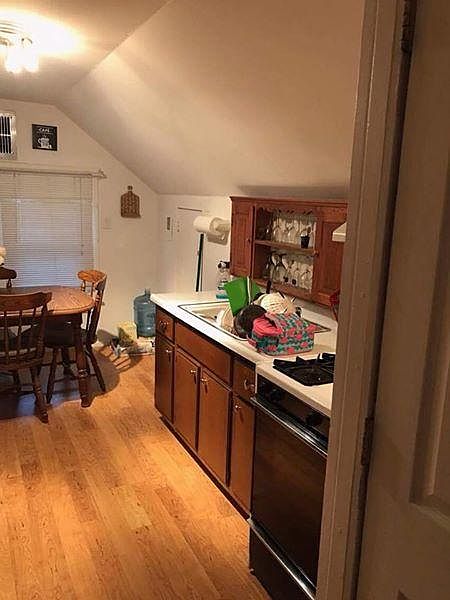 Huge storage closets on both sides of kitchen
