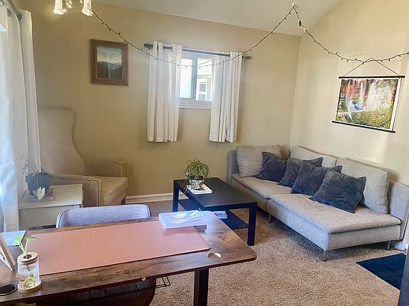 Living room with high ceilings and lots of natural light