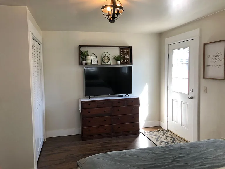 Master Bedroom- first floor. Private entrance to the back deck.
