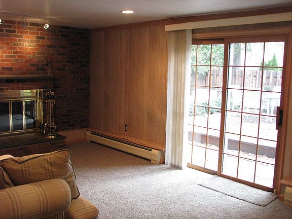 family room w/fpl and sliders to yard