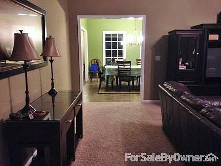 Living Room : Large living room with vaulted ceilings and gas fireplace