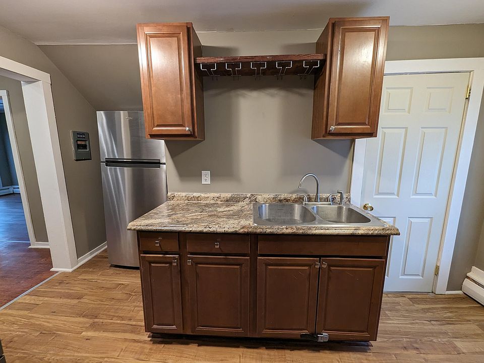 Galley Kitchen with wine glass holders