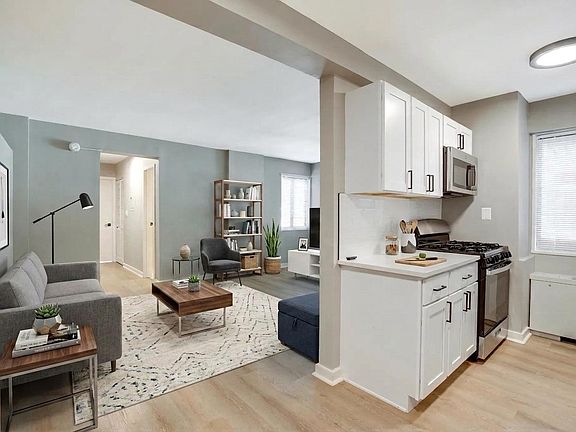 Kitchen and living room (virtually staged)