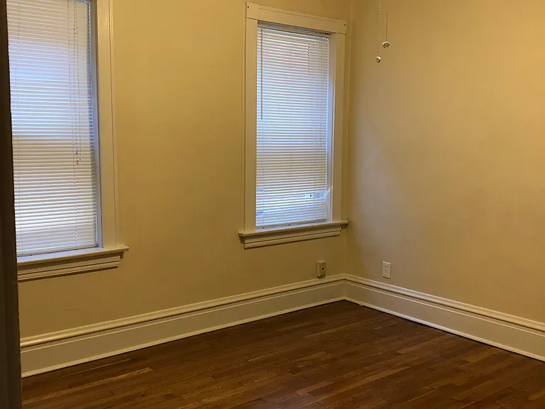 2nd bedroom 11" x 13" with hardwood flooring, ceiling fan, and large closet.