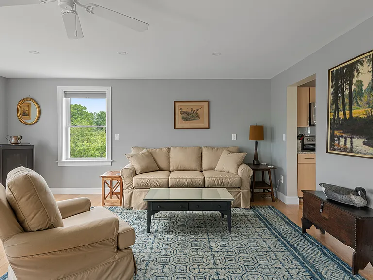 the living room with the gas fireplace