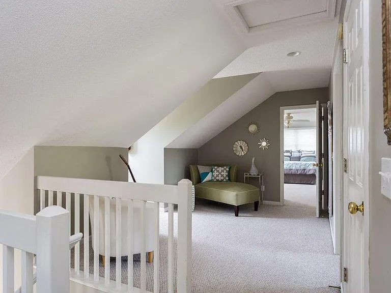 View from multipurpose space into upstairs largest bedroom sometimes used as a master.