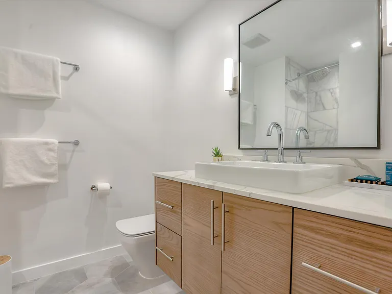 There is a full bathroom on the second floor of the condo.