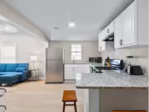 Open Concept Kitchen - Opens to Living room and Eat-In kitchen area.