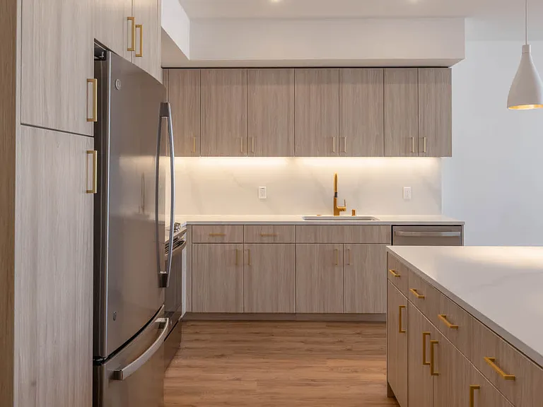 Kitchen with Stainless Steel Appliances and Quartz Countertops