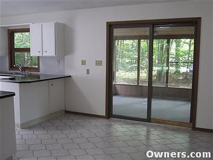 Dining Room with view of screened in porch