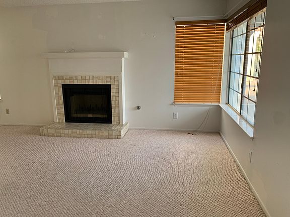 Living room with fireplace.