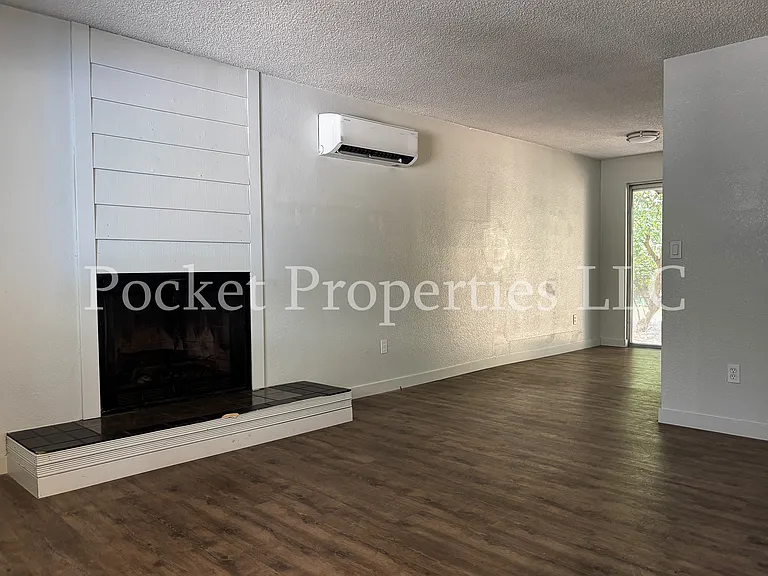 Living room open concept to kitchen and dining space