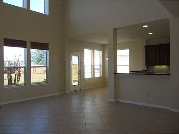 Kitchen opens to the living area.