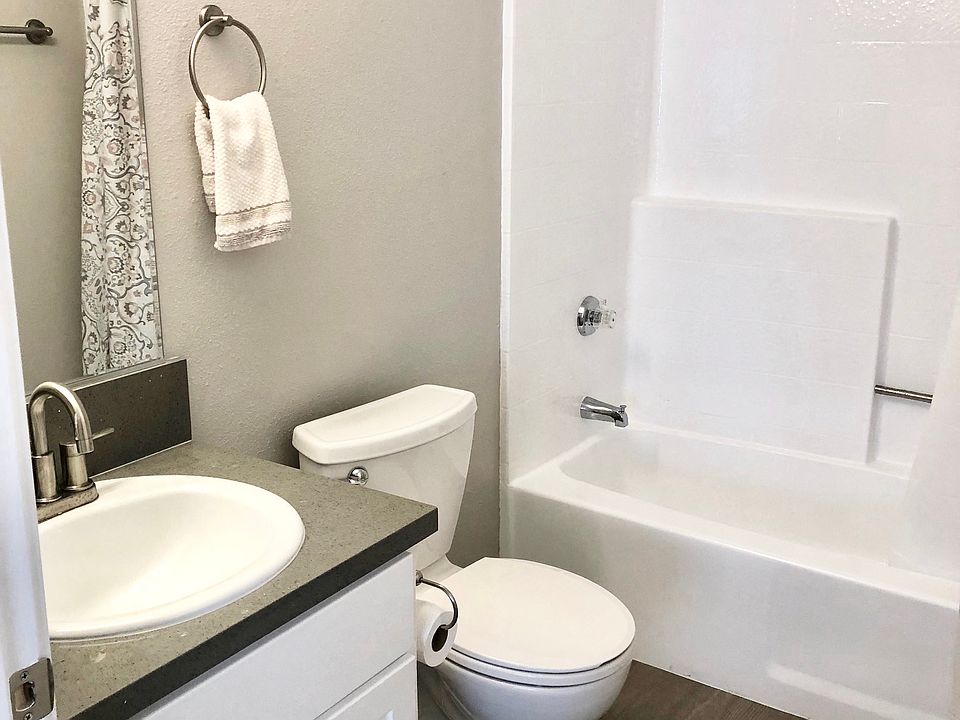 210 Garfield bathroom vanity, toilet, and shower