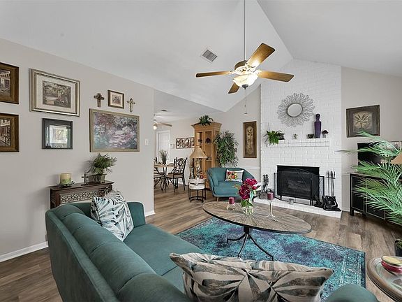 Cozy living area with fireplace.