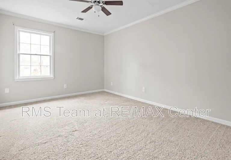 320 Saint Simons Cv — Photo 29