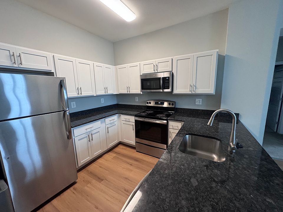 kitchen with peninsula open to living room